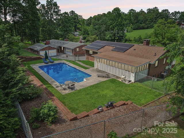 318 Old Leicester Hwy, Asheville, NC 28806 - pool at dusk featuring a fenced backyard, a patio area, and a gate