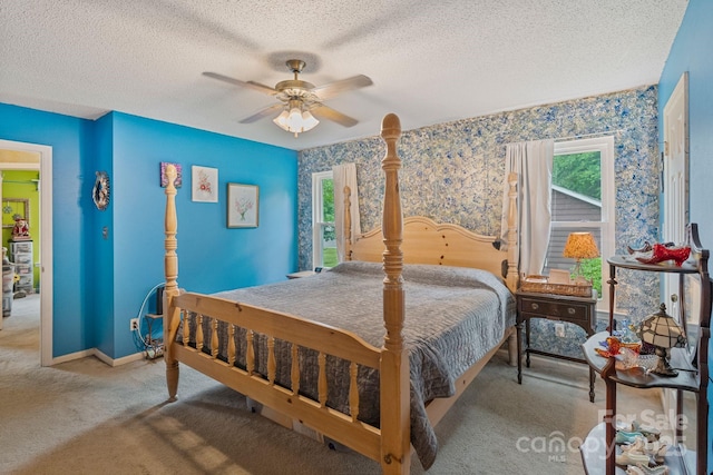 4810 Shea Ct, Monroe, NC 28110 - bedroom featuring carpet flooring, a textured ceiling, baseboards, wallpapered walls, and ceiling fan