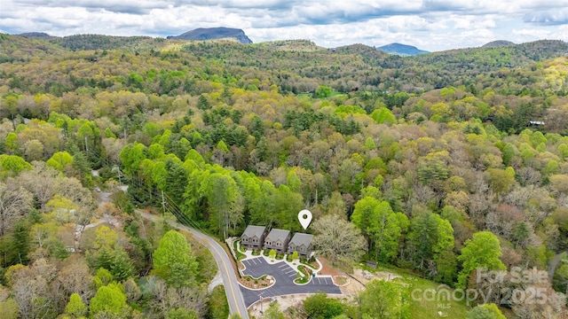 1085 Hicks Rd Unit A, Highlands, NC 28741 - drone / aerial view of a heavily wooded area and a mountainous background