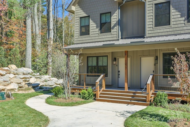 1085 Hicks Rd Unit B, Highlands, NC 28741 - view of front facade featuring board and batten siding and a porch