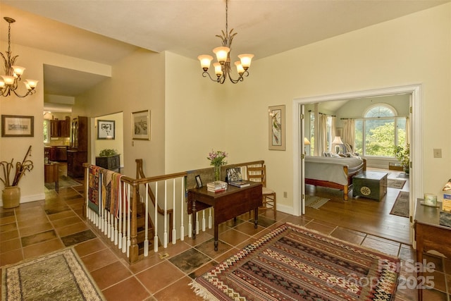 25 Windsong Dr, Fairview, NC 28730 - hall with a chandelier, an upstairs landing, and baseboards