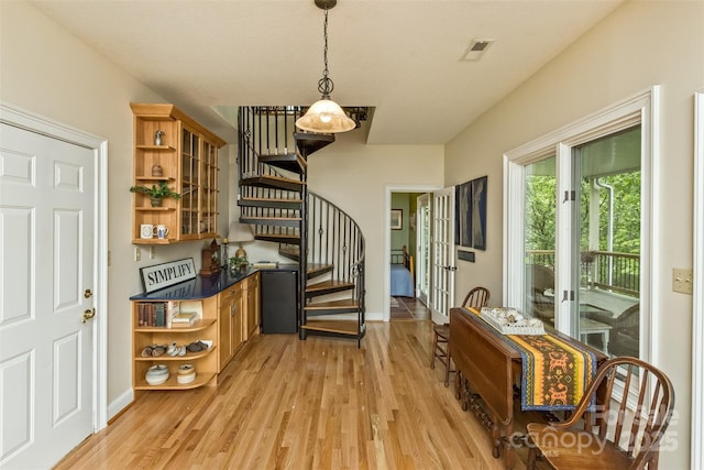 25 Windsong Dr, Fairview, NC 28730 - foyer featuring stairs, light wood-style flooring, and baseboards