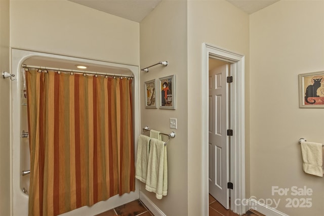 25 Windsong Dr, Fairview, NC 28730 - full bathroom with baseboards and tile patterned flooring