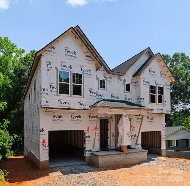 5615 Lantana Ave Unit B, Charlotte, NC 28205 - property in mid-construction featuring a garage and dirt driveway