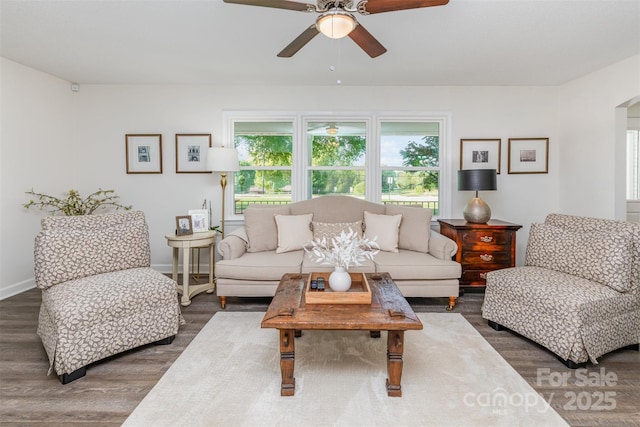 1041 Brawley School Rd, Mooresville, NC 28117 - living area featuring ceiling fan, healthy amount of natural light, wood finished floors, and baseboards