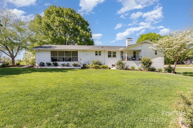 1041 Brawley School Rd, Mooresville, NC 28117 - ranch-style house featuring a chimney and a front yard