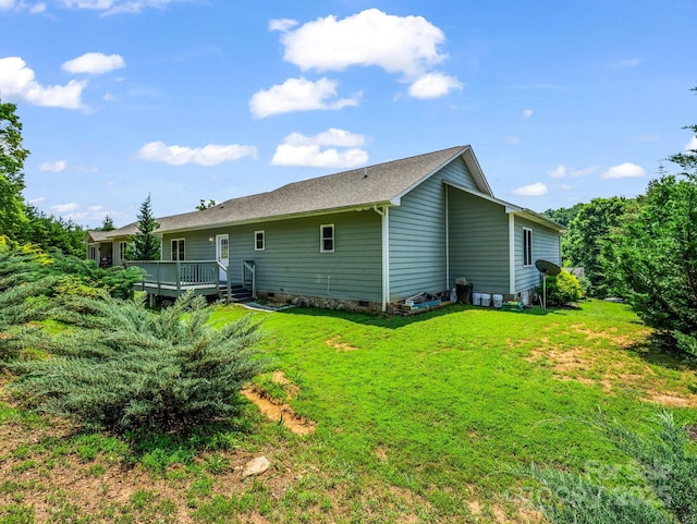 2301 Saratoga Run, Morganton, NC 28655 - back of house featuring a deck and a lawn