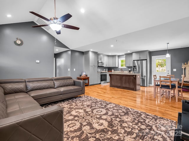2301 Saratoga Run, Morganton, NC 28655 - living room featuring a ceiling fan, light wood-style flooring, recessed lighting, and high vaulted ceiling