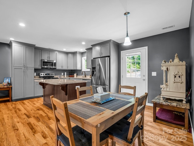 2301 Saratoga Run, Morganton, NC 28655 - dining area with light wood-style flooring, recessed lighting, and baseboards