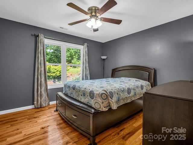 2301 Saratoga Run, Morganton, NC 28655 - bedroom with wood finished floors, baseboards, and ceiling fan