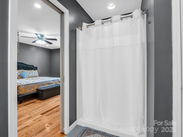 2301 Saratoga Run, Morganton, NC 28655 - ensuite bathroom featuring a ceiling fan, curtained shower, wood finished floors, and recessed lighting