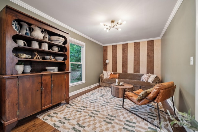 2507 Connemara Dr, Matthews, NC 28105 - living room with ornamental molding, a chandelier, wood finished floors, baseboards, and wallpapered walls
