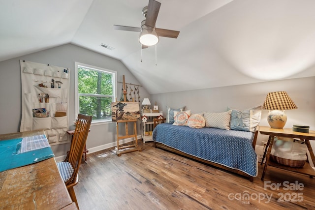 2507 Connemara Dr, Matthews, NC 28105 - bedroom featuring wood finished floors, vaulted ceiling, and ceiling fan