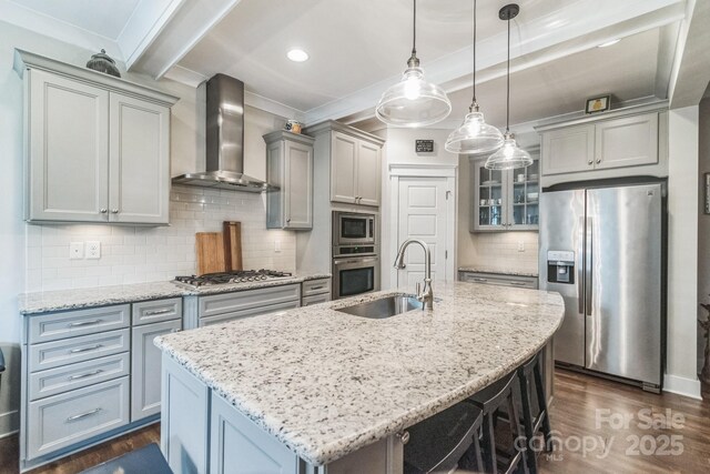 2112 Balting Glass Dr, Indian Trail, NC 28079 - kitchen featuring stainless steel appliances, a sink, wall chimney exhaust hood, gray cabinetry, and dark wood finished floors