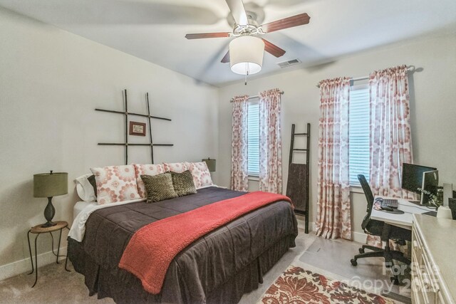 2112 Balting Glass Dr, Indian Trail, NC 28079 - carpeted bedroom featuring baseboards, an office area, and a ceiling fan