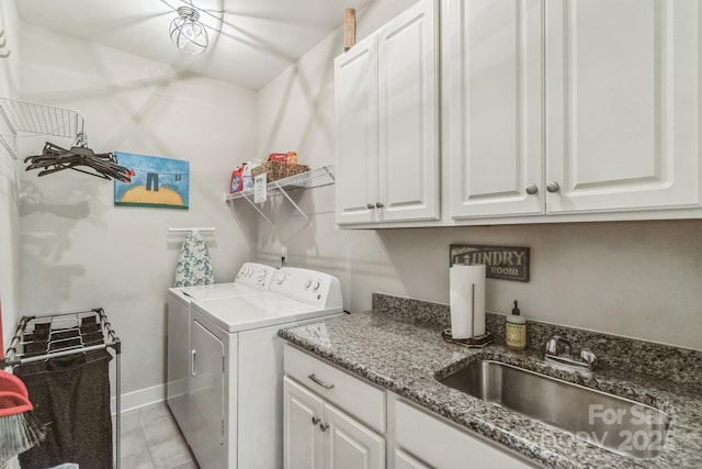 2112 Balting Glass Dr, Indian Trail, NC 28079 - washroom featuring washer and clothes dryer, cabinet space, and baseboards