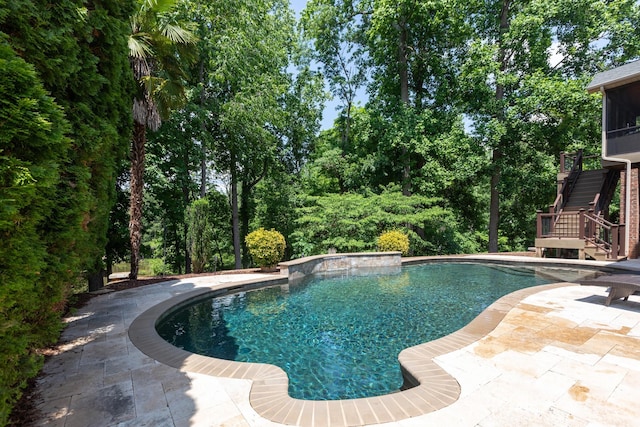 132 Parkside Ln, Mooresville, NC 28117 - swimming pool featuring stairway, a patio area, and a sunroom