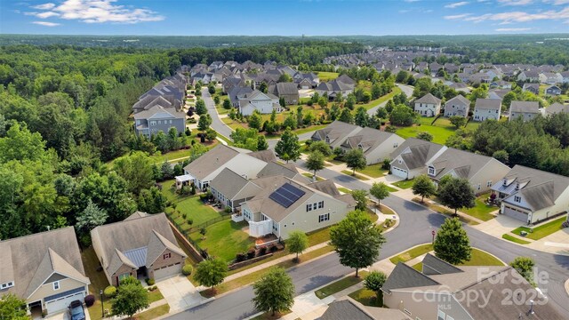 417 Brier Knob Dr, Fort Mill, SC 29715 - aerial perspective of suburban area with a forest
