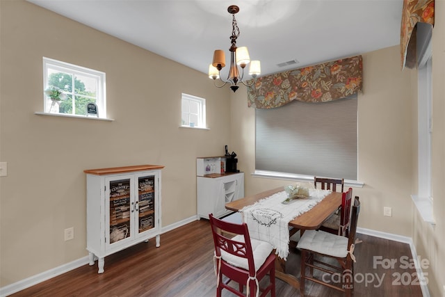 417 Brier Knob Dr, Fort Mill, SC 29715 - dining room featuring a chandelier, wood finished floors, and healthy amount of natural light