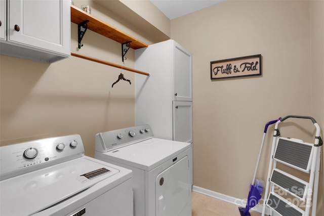 417 Brier Knob Dr, Fort Mill, SC 29715 - laundry area featuring cabinet space, separate washer and dryer, and light tile patterned floors