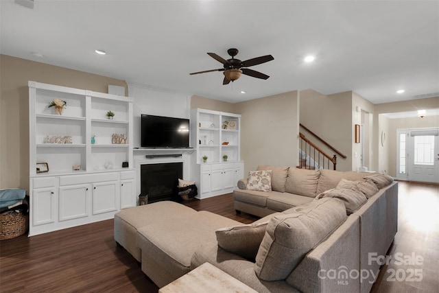 417 Brier Knob Dr, Fort Mill, SC 29715 - living room with dark wood-style flooring, ceiling fan, a fireplace, stairs, and recessed lighting