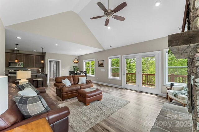 552 High Trail Dr, Nebo, NC 28761 - living area featuring high vaulted ceiling, a ceiling fan, light wood finished floors, and recessed lighting