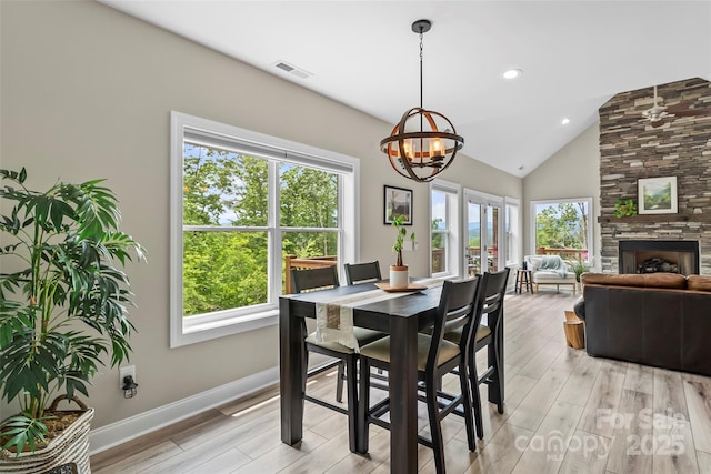 552 High Trail Dr, Nebo, NC 28761 - dining space featuring healthy amount of natural light, light wood-style floors, a chandelier, recessed lighting, and high vaulted ceiling