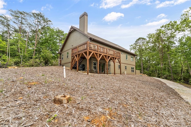 552 High Trail Dr, Nebo, NC 28761 - rear view of property featuring a deck, a chimney, and stairway