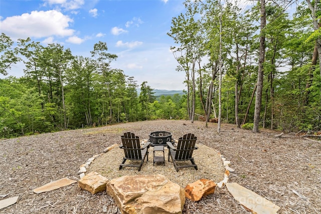 552 High Trail Dr, Nebo, NC 28761 - view of yard featuring a fire pit and a forest view