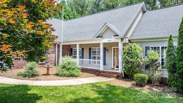 5362 Beacon Ridge Dr, Granite Falls, NC 28630 - view of front of home with a porch, roof with shingles, and a front yard