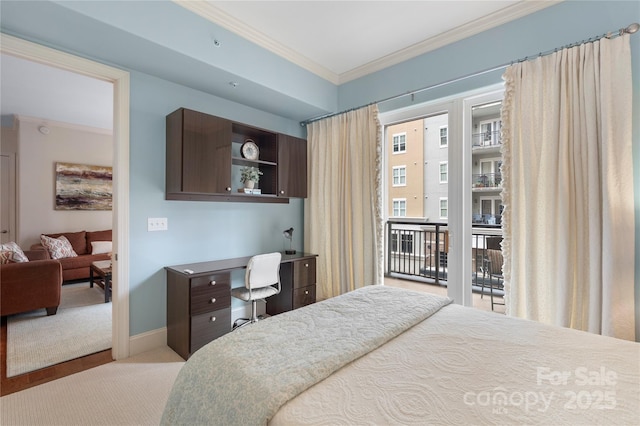 4620 Piedmont Row Dr Unit 308, Charlotte, NC 28210 - carpeted bedroom with crown molding, access to exterior, and baseboards