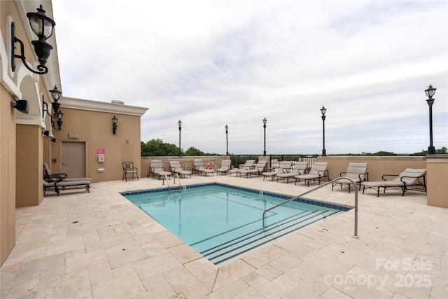 4620 Piedmont Row Dr Unit 308, Charlotte, NC 28210 - community pool featuring a patio