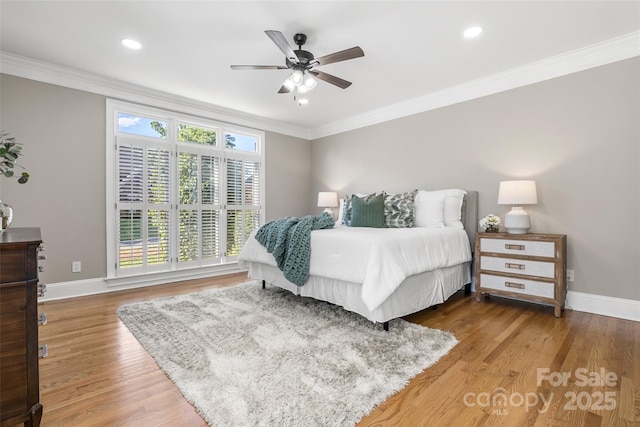 9219 Whispering Wind Dr, Charlotte, NC 28277 - bedroom featuring ornamental molding, baseboards, wood finished floors, recessed lighting, and ceiling fan