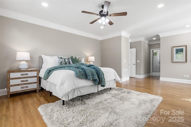 9219 Whispering Wind Dr, Charlotte, NC 28277 - bedroom with crown molding, baseboards, wood finished floors, recessed lighting, and ceiling fan