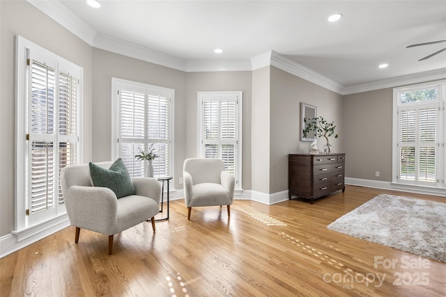 9219 Whispering Wind Dr, Charlotte, NC 28277 - living area with light wood-style floors, baseboards, ornamental molding, a ceiling fan, and recessed lighting