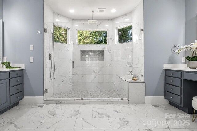 9219 Whispering Wind Dr, Charlotte, NC 28277 - full bath featuring baseboards, vanity, marble finish floors, and a marble finish shower