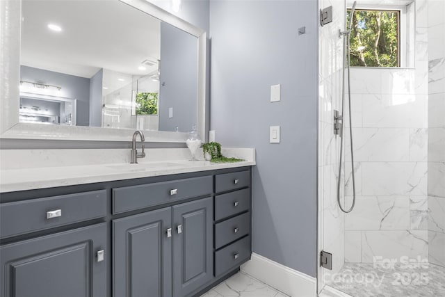 9219 Whispering Wind Dr, Charlotte, NC 28277 - full bathroom featuring marble finish floors, baseboards, vanity, a marble finish shower, and healthy amount of natural light
