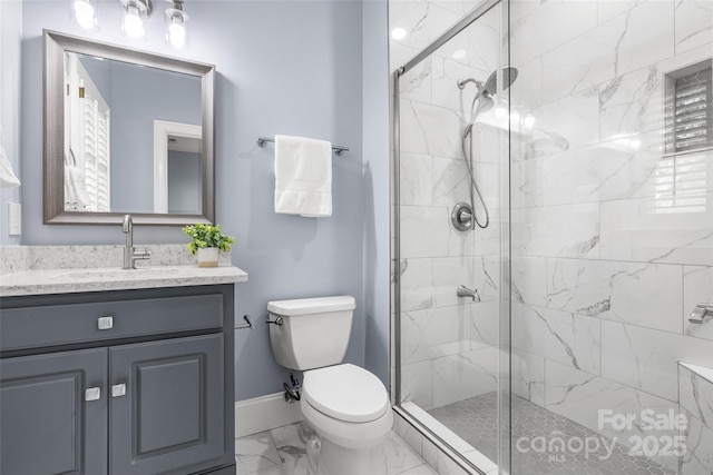 9219 Whispering Wind Dr, Charlotte, NC 28277 - full bath with marble look tiles, a shower stall, toilet, and vanity