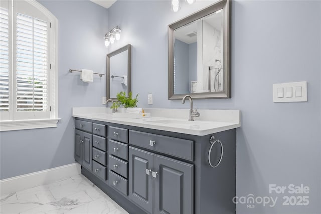 9219 Whispering Wind Dr, Charlotte, NC 28277 - full bath with marble finish flooring, double vanity, and baseboards