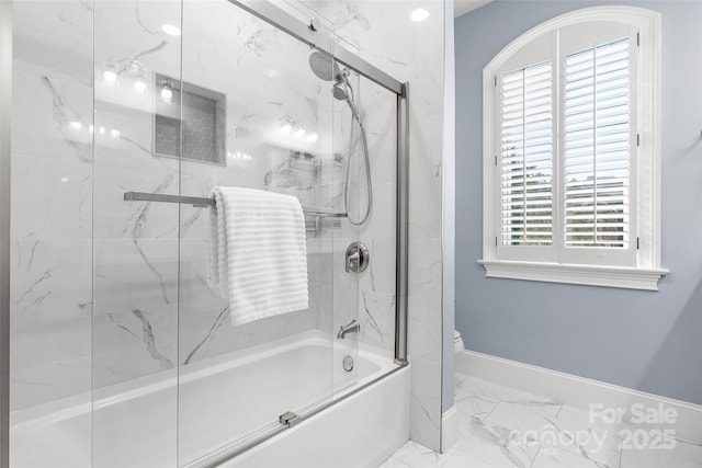 9219 Whispering Wind Dr, Charlotte, NC 28277 - bathroom featuring marble look tiles, enclosed tub / shower combo, plenty of natural light, and toilet