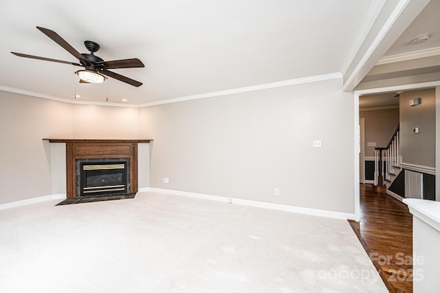 2728 Touchstone Cir, Newton, NC 28658 - unfurnished living room featuring a ceiling fan, crown molding, stairway, baseboards, and a fireplace with flush hearth