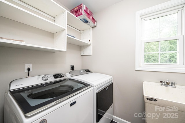 2728 Touchstone Cir, Newton, NC 28658 - washroom featuring washing machine and clothes dryer and baseboards