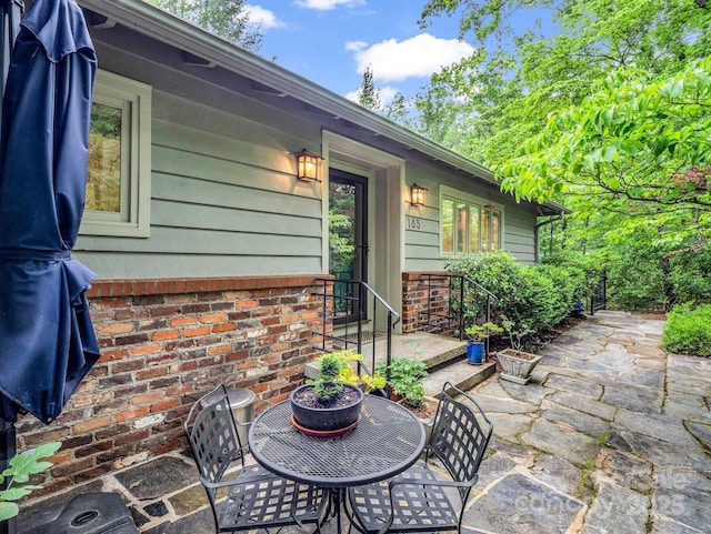 185 Greenstoke Loop, Tryon, NC 28782 - view of patio featuring outdoor dining space