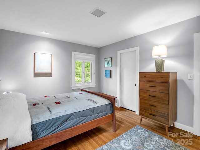 185 Greenstoke Loop, Tryon, NC 28782 - bedroom with wood finished floors and baseboards