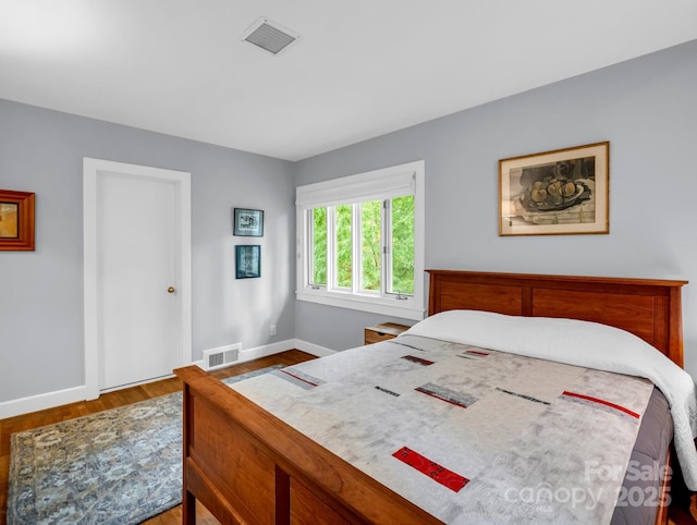185 Greenstoke Loop, Tryon, NC 28782 - bedroom with baseboards and wood finished floors