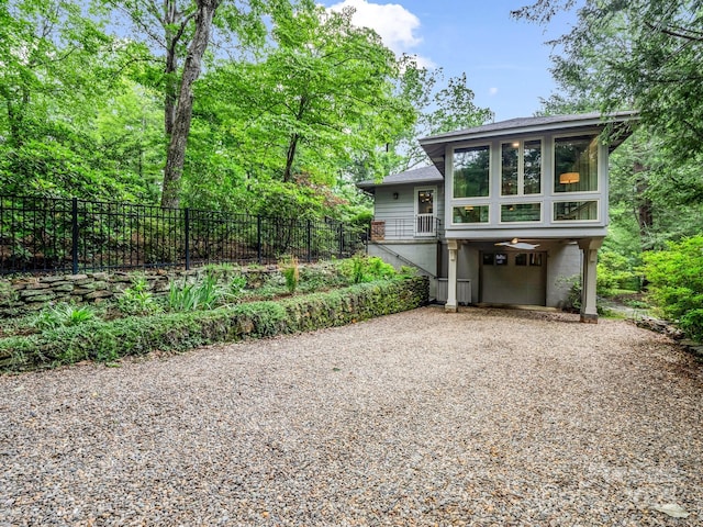 185 Greenstoke Loop, Tryon, NC 28782 - view of front of home with gravel driveway and a garage