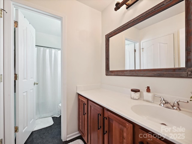 1109 Woodwinds Dr, Waxhaw, NC 28173 - full bathroom with vanity, toilet, and a shower with curtain