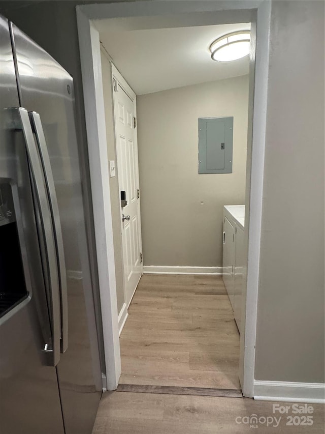 4524 Cinderella Rd, Charlotte, NC 28213 - washroom featuring electric panel, washing machine and dryer, light wood finished floors, and baseboards