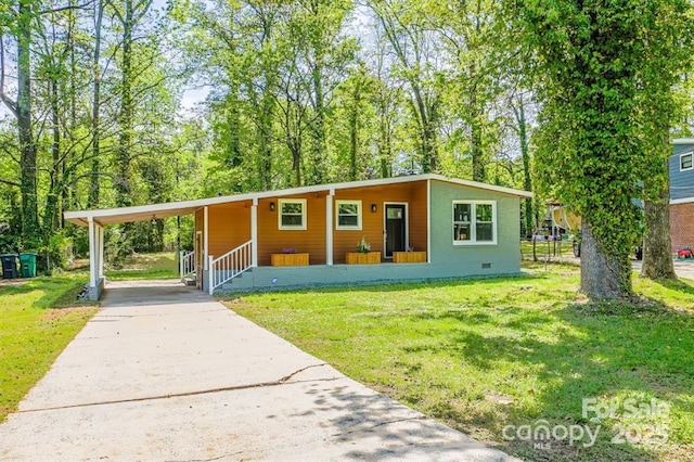4524 Cinderella Rd, Charlotte, NC 28213 - view of front of property featuring concrete driveway, a front lawn, crawl space, and a carport
