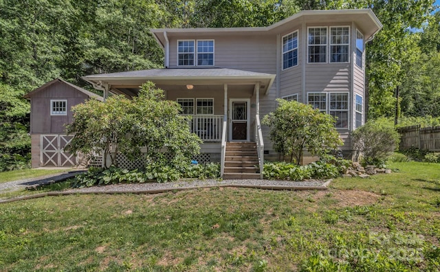 619 Beaverdam Rd, Asheville, NC 28804 - view of front of house with a porch, an outbuilding, and a barn
